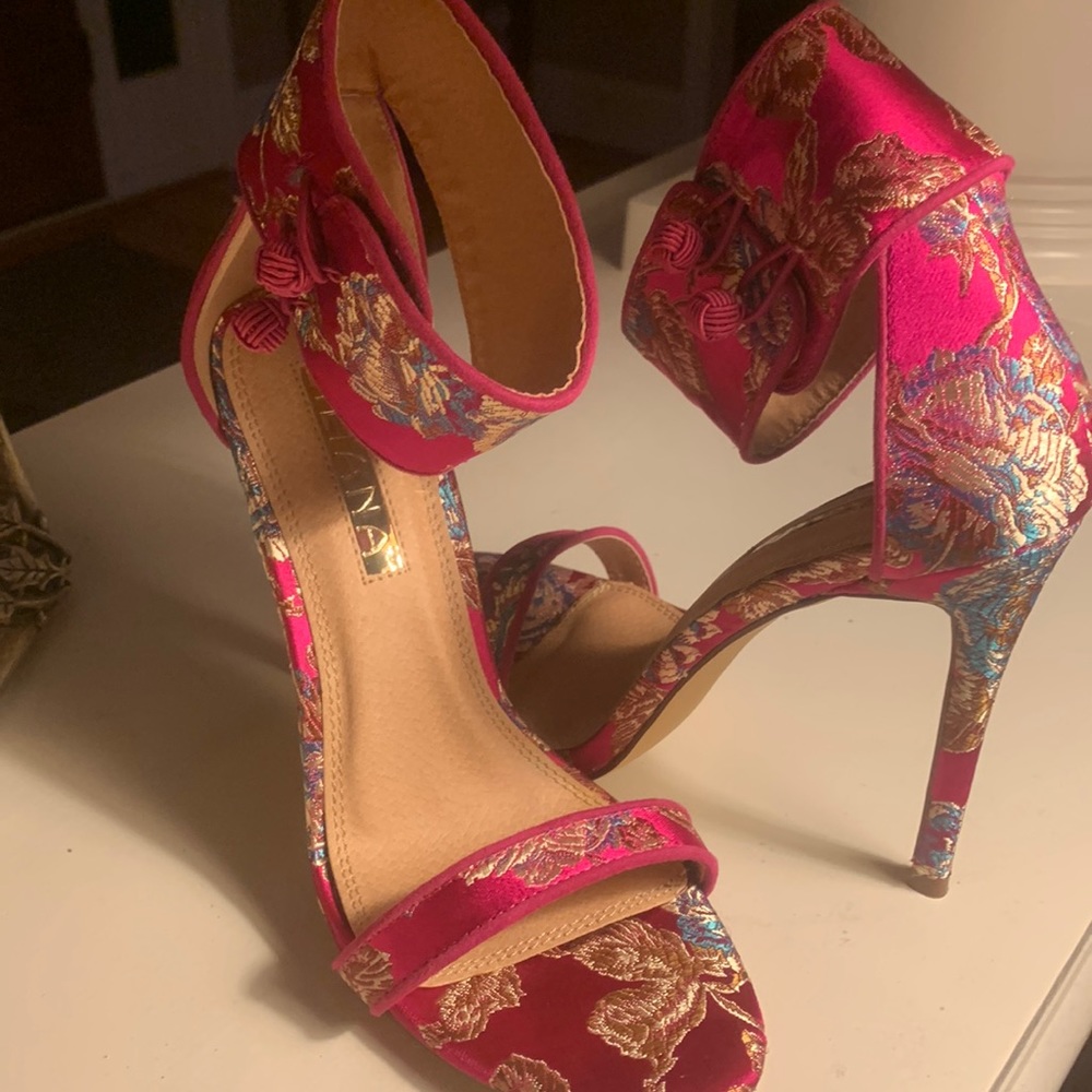 Liliana shoes are hot pink floral with blue & cream